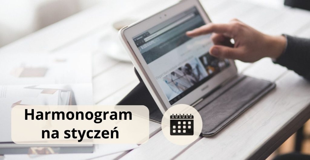 ręka wskazująca na tablet, napis harmonogram na styczeń