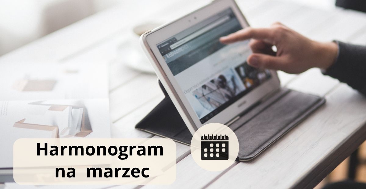 ręka wskazująca na tablet, napis harmonogram na marzec